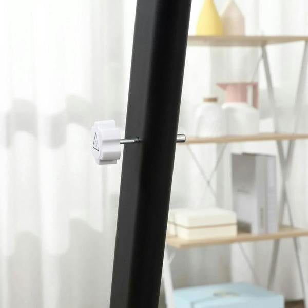 Black folding treadmill support post with side locking latch for transport