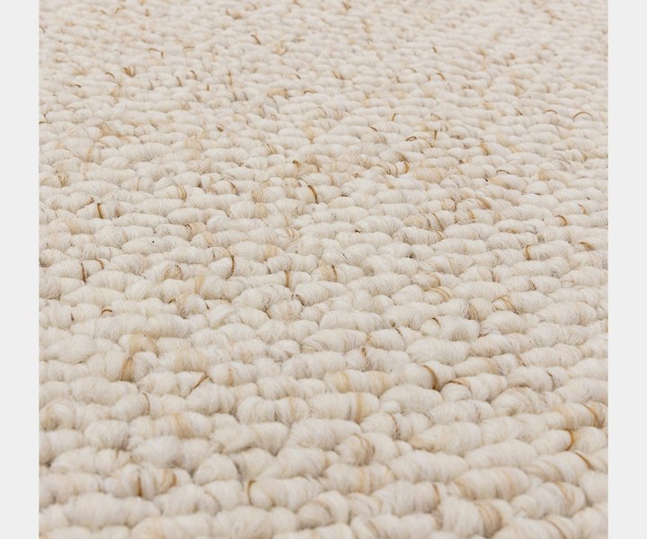 Handcrafted Boden Ivory Rug highlighting high-quality materials and contemporary style.