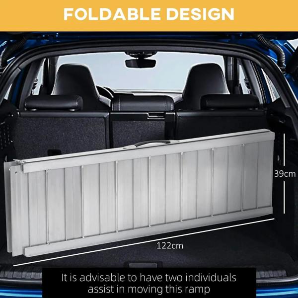 Aluminum folding wheelchair ramp stored in a car trunk with side height panel