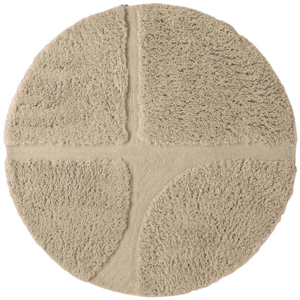 Round beige rug with a textured surface on a white background