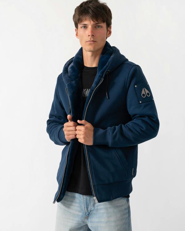 mid shot of a model wearing a Moose Knuckles Classic Bunny 3 Mens Fleece Hoodie in Nightfall 2017 