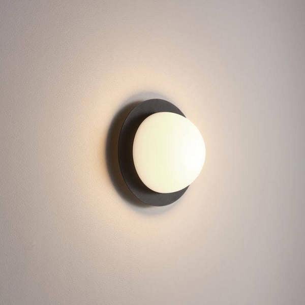 Black modern interior wall light on a white background