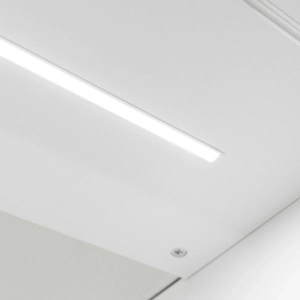 Sleek white LED light strip illuminating the top of Theia LED Shop Counter Set, enhancing modern aesthetics and visibility