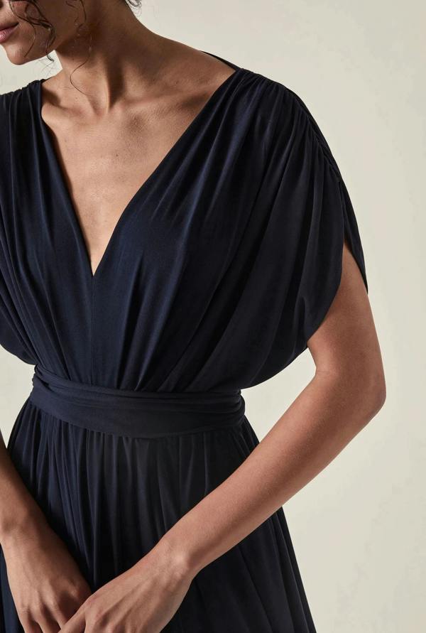 Side view of the Draped Open-Back Midi Dress in Navy by James Lakeland showing the fluid midi silhouette