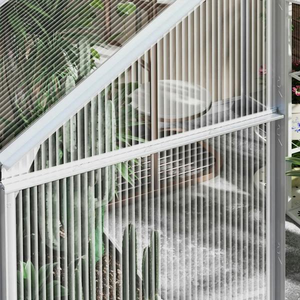 Close-up of clear polycarbonate roof panel and vertical wall bars on aluminium greenhouse