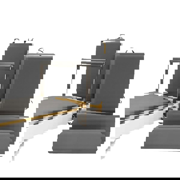 Aluminium Pilates reformer machine with grey padded cushions, adjustable headrest, and sturdy frame for versatile workouts