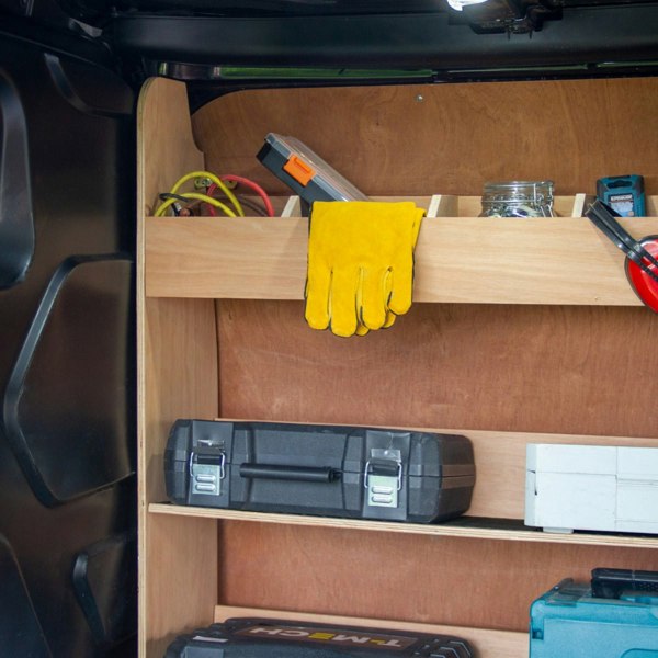 Ford Transit Custom toolbox van racking with wooden shelves, yellow gloves, tools, and storage containers organized inside