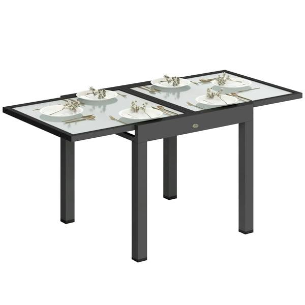 Black extendable outdoor dining table with clear tempered glass top and aluminum frame