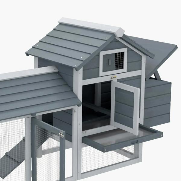 Grey chicken coop with enclosed run, ramp, and nesting box with roof overhang