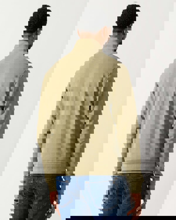 back shot of a Model wearing a Belstaff Quarter Zip Sweatshirt in Fatigue Green