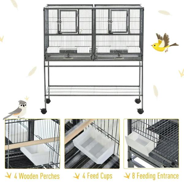Black multi-level bird cage with divider doors and base tray, four perches inset