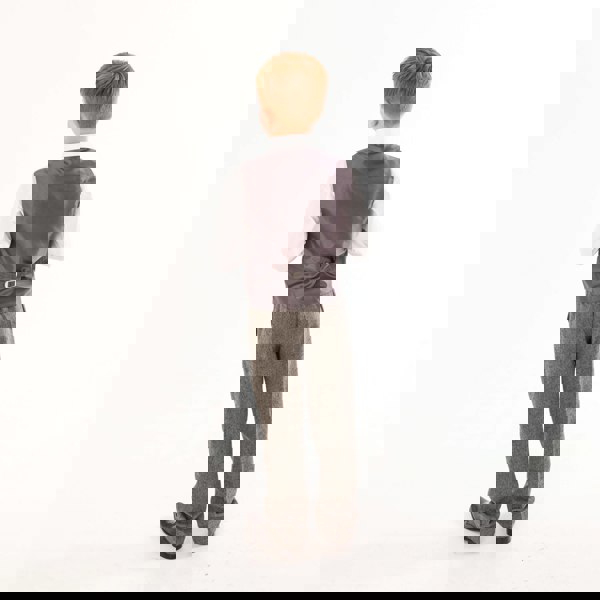 boy modelling tweed trousers and matching waistcoat