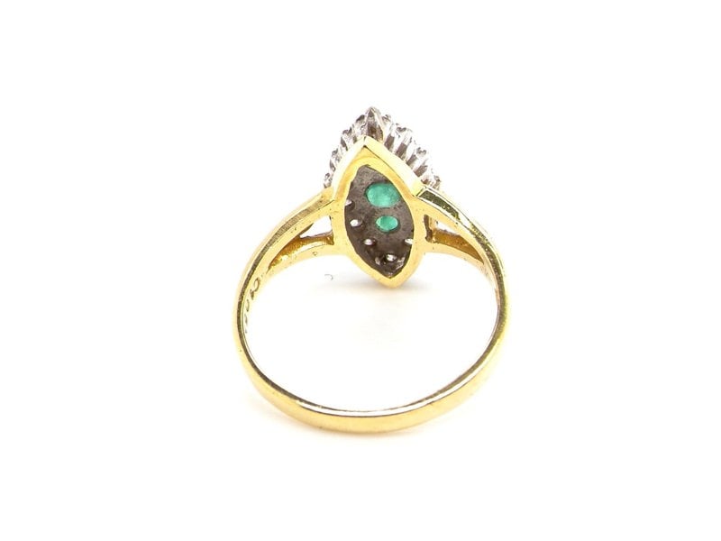 Vintage Tom An 18 carat gold emerald and diamond marquise shaped ring