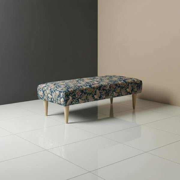 Elegant footstool with hidden storage and handcrafted stitching