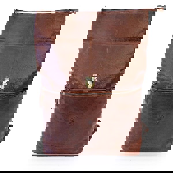 a brown leather backpack is open to show the roll top design