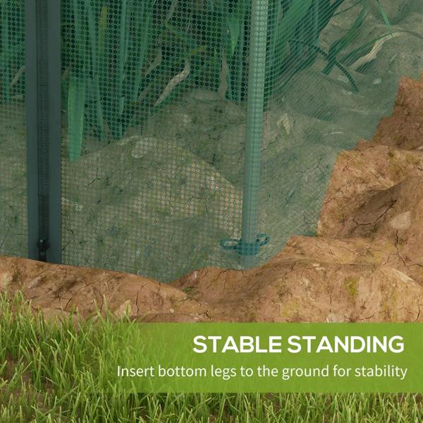 Green mesh fruit cage plant protection tent with stable bottom legs anchored in soil