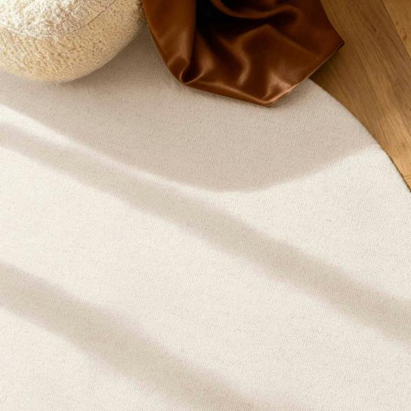 Fine Boucle Wool Rug Knots Natural White sound-absorbing, durable pile.