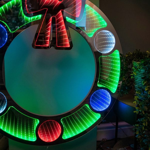 Samuel Alexander 60cm Light up Hanging Christmas Wreath Infinity Mirror with Multi-Coloured LEDs