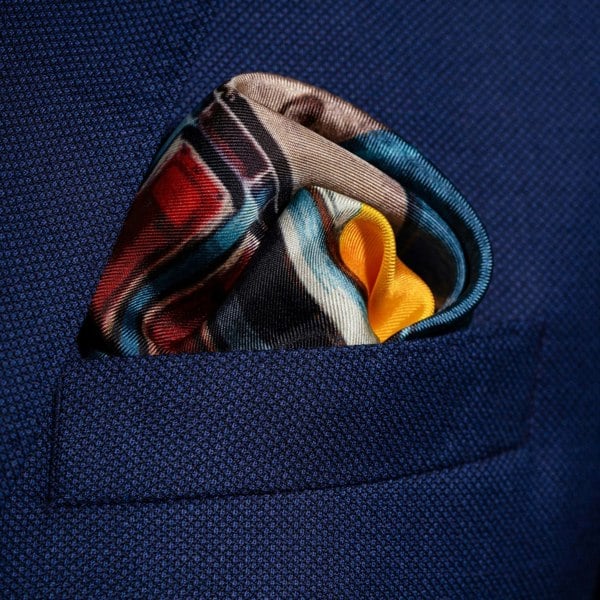 1960s American muscle car silk pocket square in blue & orange by Otway & Orford folded in top pocket