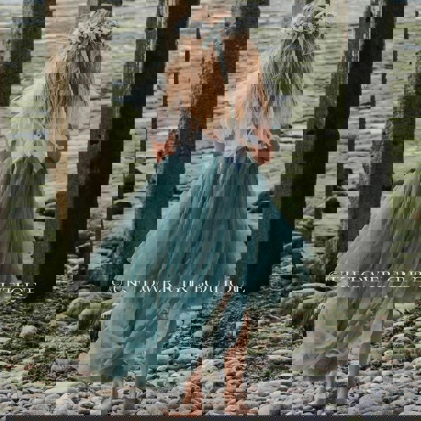 Girl at beach in pretty dress