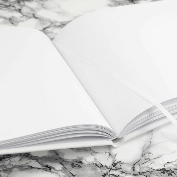 Engraved White Leather Wedding Guest Book - product in use