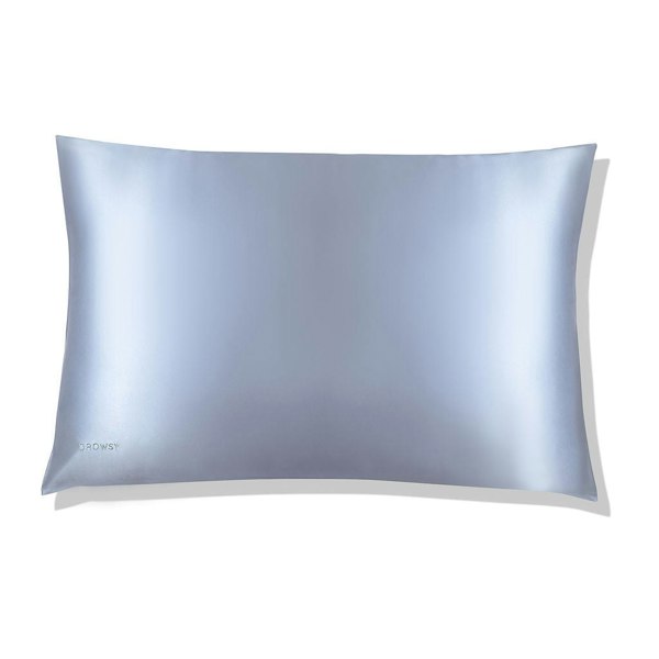 Baby blue coloured silk sleep mask on white background