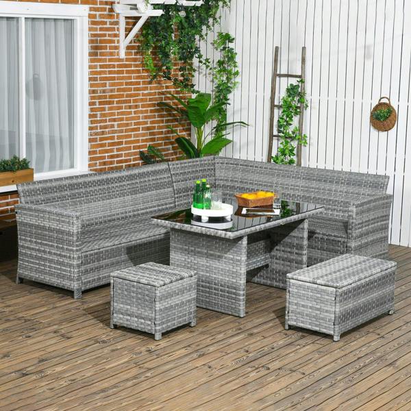 Grey rattan outdoor corner sofa set with black cushions, glass coffee table, and ottomans