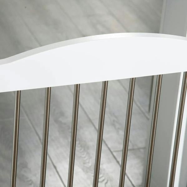Close-up of white gate top rail and vertical bars
