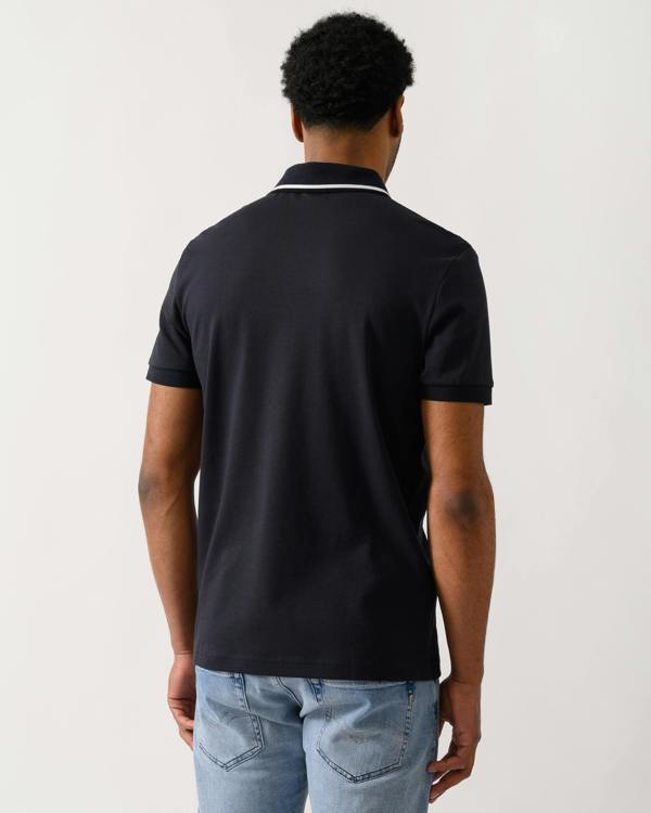back shot of a Model wearing a BOSS Green Paddy Mens Slim-Fit Polo Shirt in Interlock Cotton in Dark Blue 402