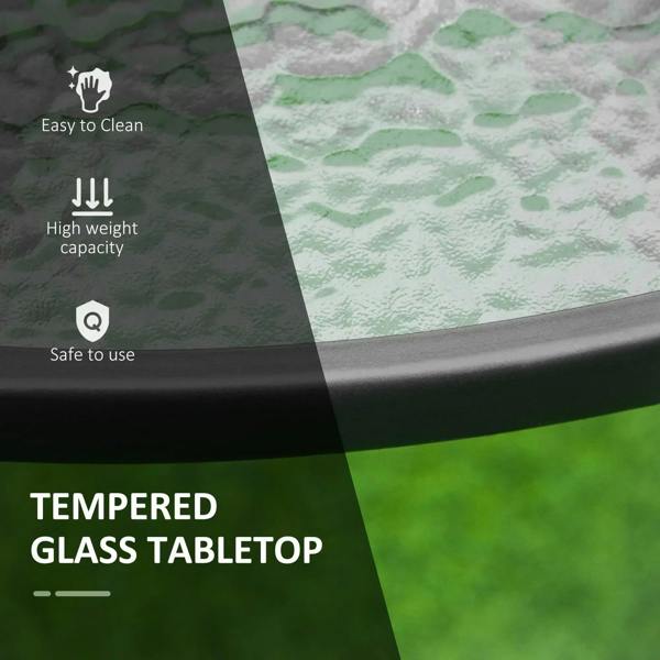 Tempered glass tabletop on a black round patio dining table with steel frame