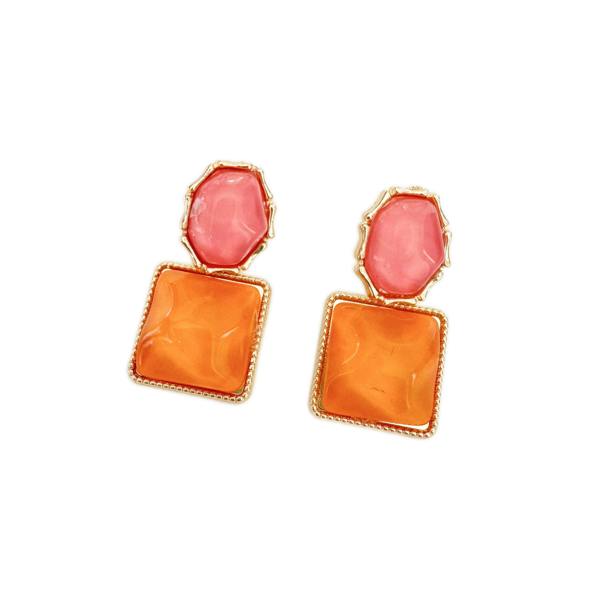 Pair of earrings with orange and pink stones on a white background