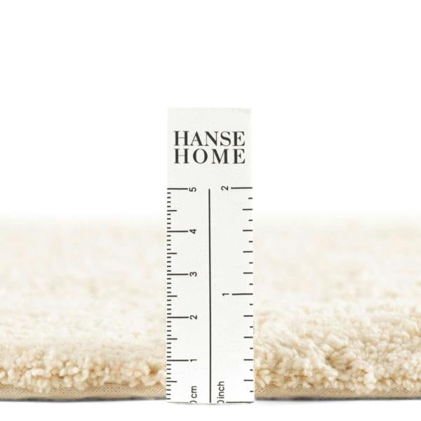 Hanse Home rug with a ruler for scale on a white background
