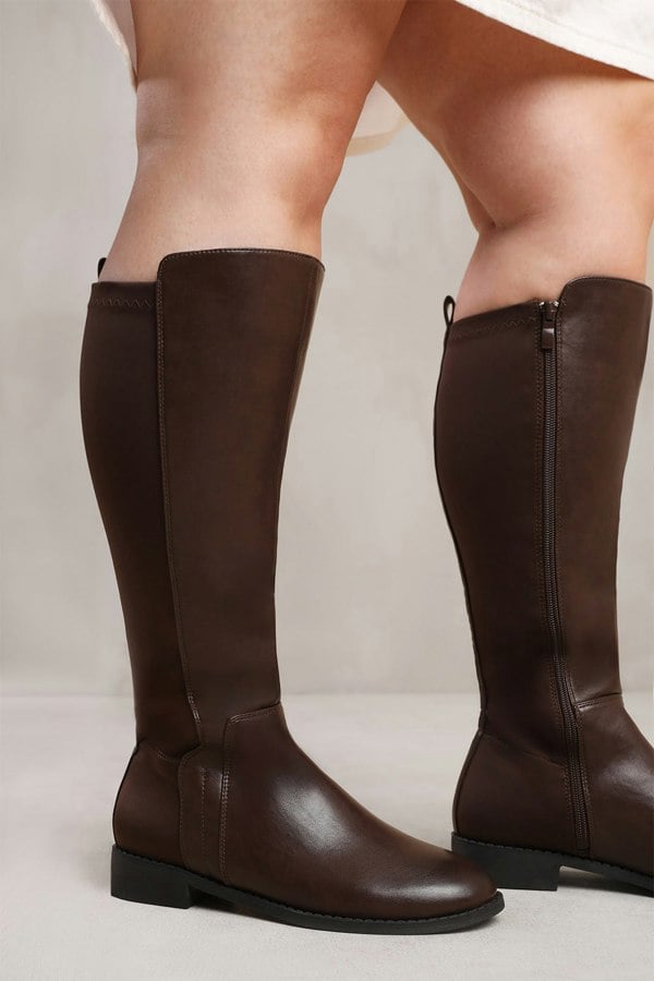 Where's That From Parker Stretch Wide Calf Knee High Boots With Side Zip In Wide E Fit In Dark Brown Faux Leather