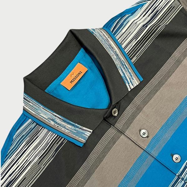 Supplied Fashion Missoni short sleeve polo shirt in blue, grey, and white striped knit with a classic collar