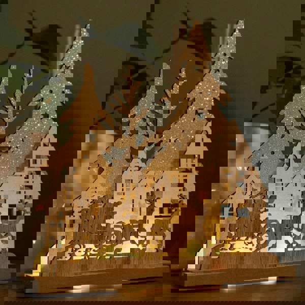 Samuel Alexander 20cm Battery Operated Light up Wooden Village with Santa in Sleigh and Warm White LEDs