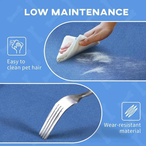Blue pet bed fabric with hand wiping, showing easy-clean surface texture