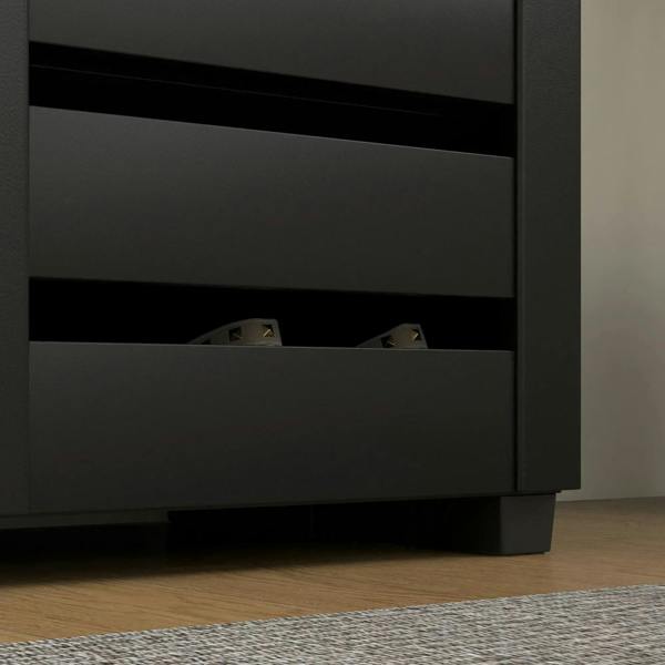 Black narrow shoe cabinet lower section with slatted door interior storage