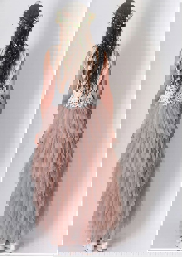 Rear details of set showing long hair and garland trailing