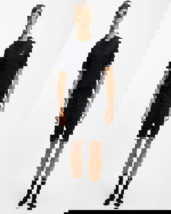 Model Wearing BOSS Orange Authentic Mens Loungewear Shorts with Stripe and Logo in Black 004 - Full length