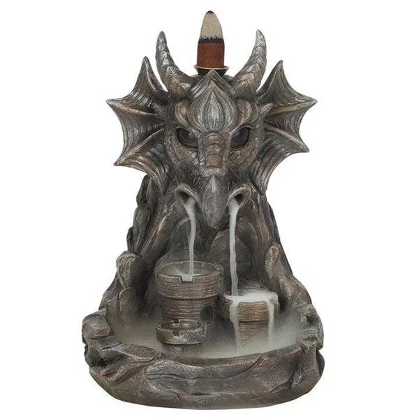 Grey dragon backflow incense burner with incense sticks and central smoky tray