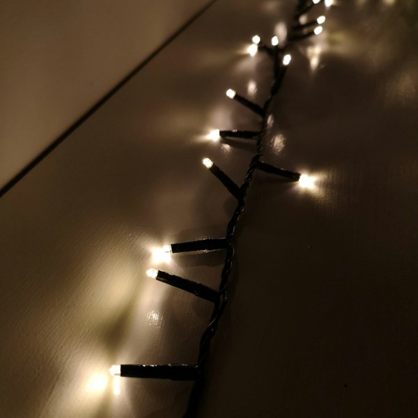Samuel Alexander 1000 LED 25m Indoor Outdoor Christmas Multi Function Mains Operated String Lights with Timer in in Warm White