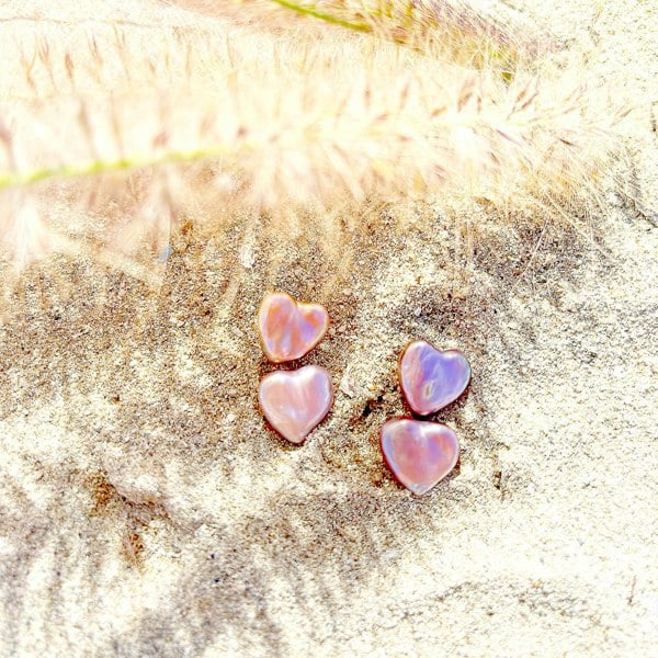 Double heart pearls ear jacket earrings. Real heart pearls, natural, beautiful. Shop now.