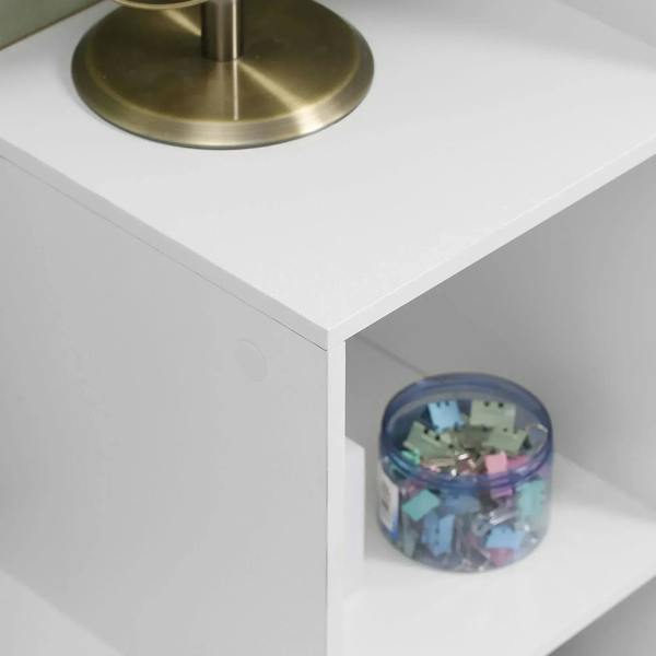 White cube storage shelf unit with open cubby and visible corner seam
