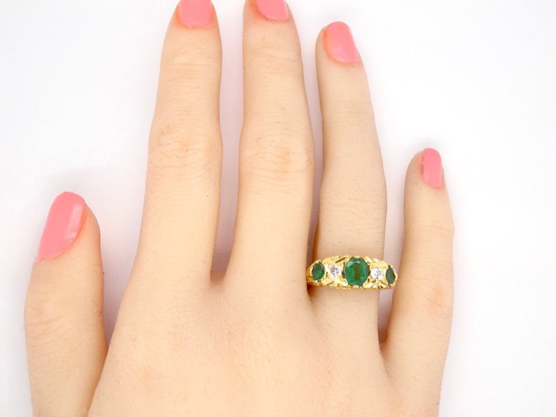 Vintage Tom A five stone emerald and diamond ring