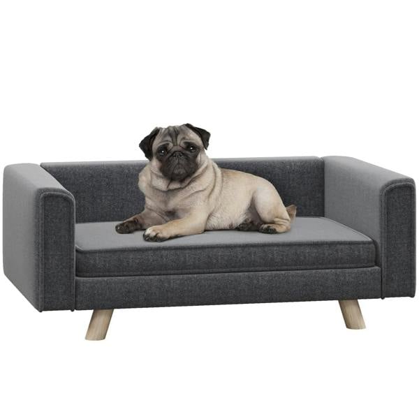 Grey dog sofa bed with cushion and armrests, pug lying on it