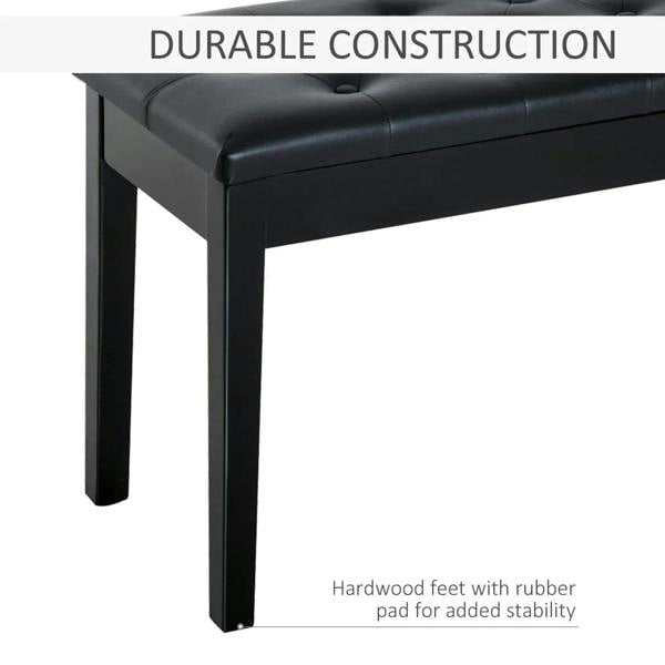 Black upholstered piano stool bench with square tapered legs and padded seat