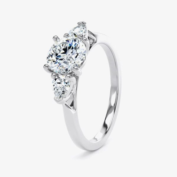 T. H. Baker Platinum 0.70ct Brilliant Cut & Pear Cut Diamond Three Stone Ring M3R03-050-070-PT-G-SI1