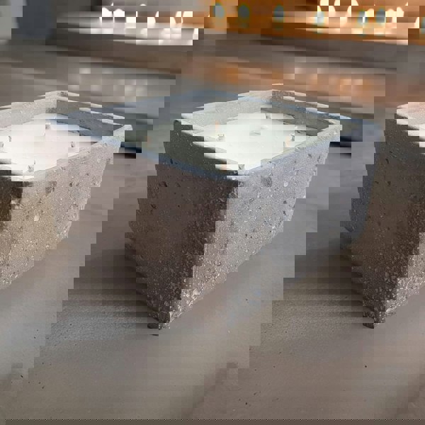 Urban candle in concrete square