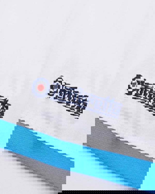 Lambretta Mens Festival Ringer Casual Retro Soul SKA T-Shirt, close-up of embroidered logo with white fabric and blue collar detail.