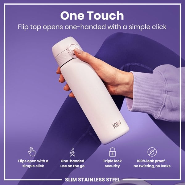 A white, slim stainless steel water bottle is being held; its flip top opens one-handed with a simple click; against a purple background.